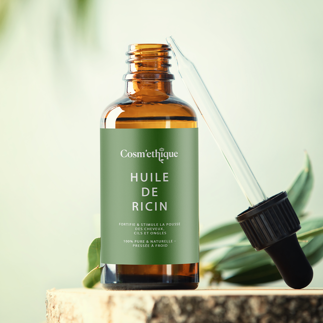 Huile de ricin dans une bouteille en verre avec tube